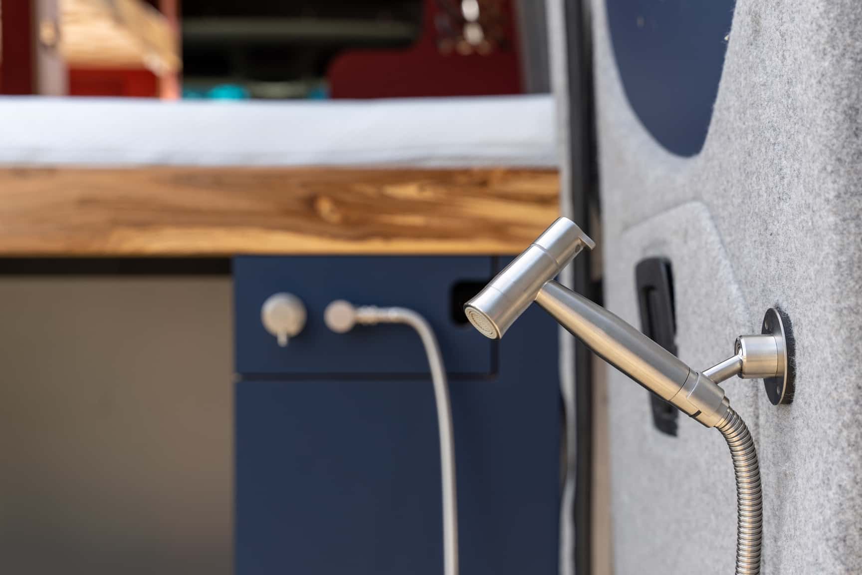 Outdoor shower at the rear of the Sprinter L3H2 conversion